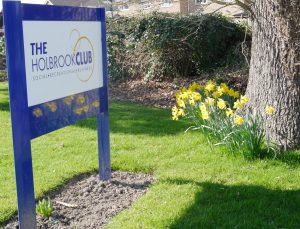 Signage with daffodils