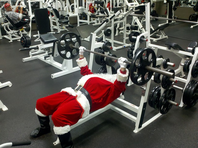 Santa Claus works out in gym